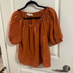 Burnt orange puffy sleeved blouse, never worn